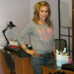 Ivonne beside the nail stations